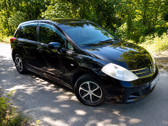 Nissan Tiida - фото 3