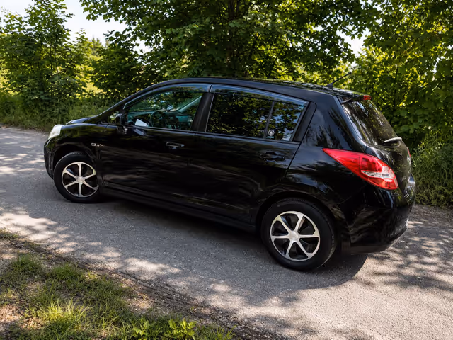Nissan Tiida - фото 4