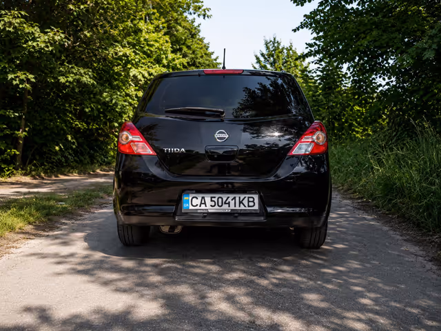 Nissan Tiida - фото 5