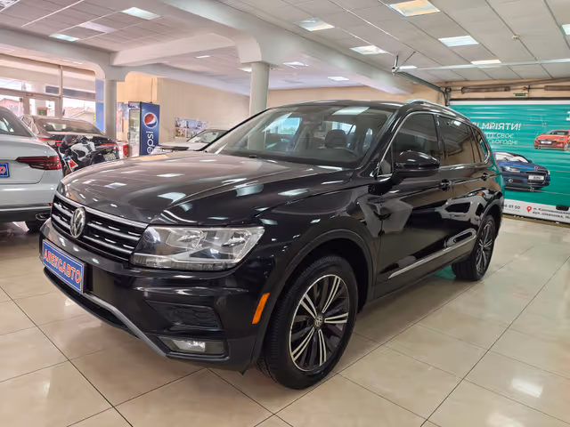 Volkswagen Tiguan - фото 1