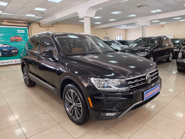 Volkswagen Tiguan - фото 4