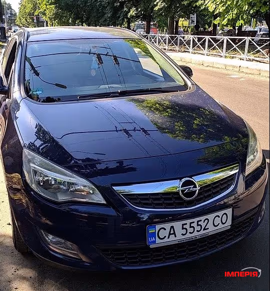 Opel Astra - фото 1