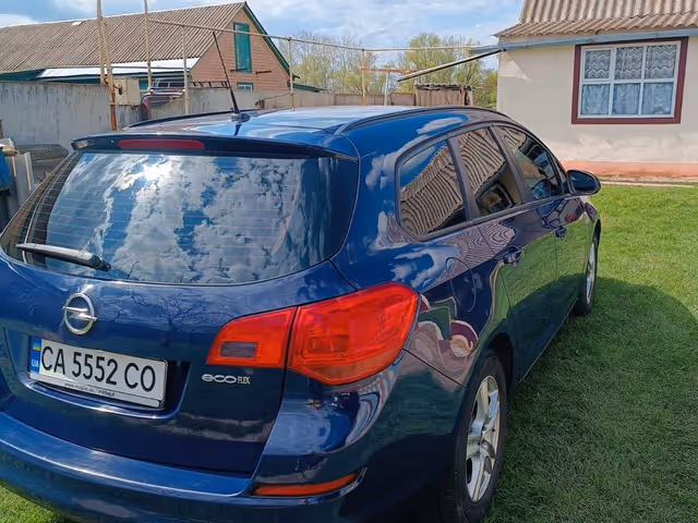 Opel Astra - фото 4