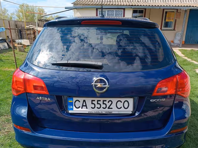 Opel Astra - фото 5
