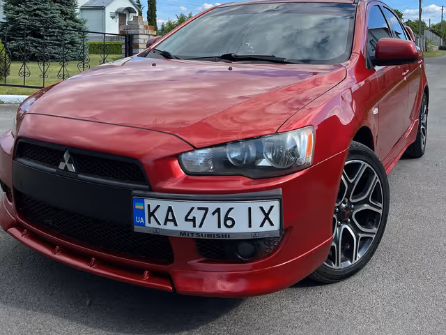 Mitsubishi Lancer - фото 1