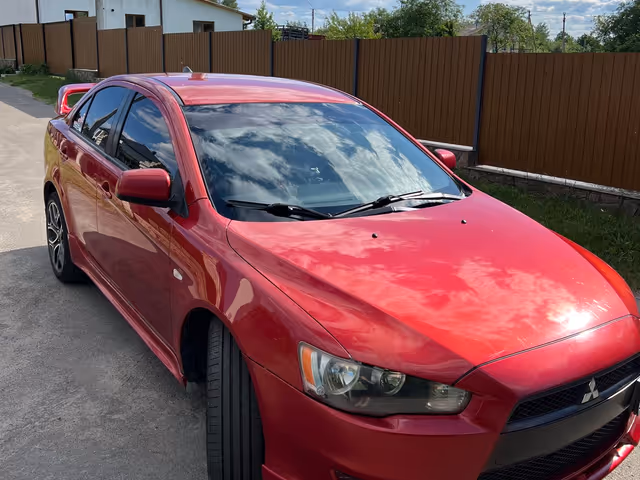 Mitsubishi Lancer - фото 4