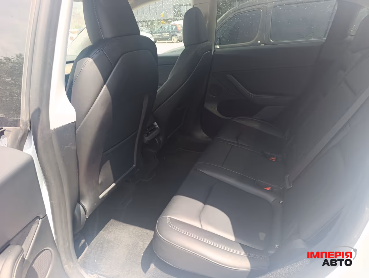 Tesla Model Y - фото 11