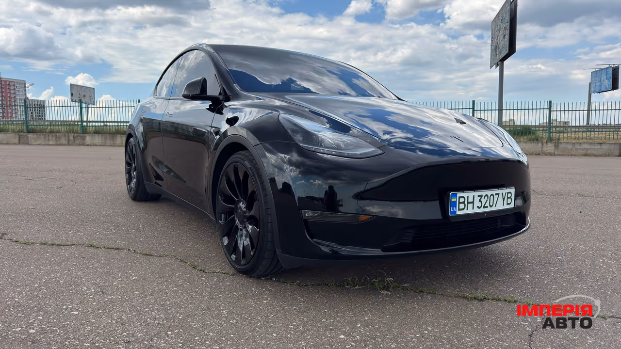 Tesla Model Y - фото 12