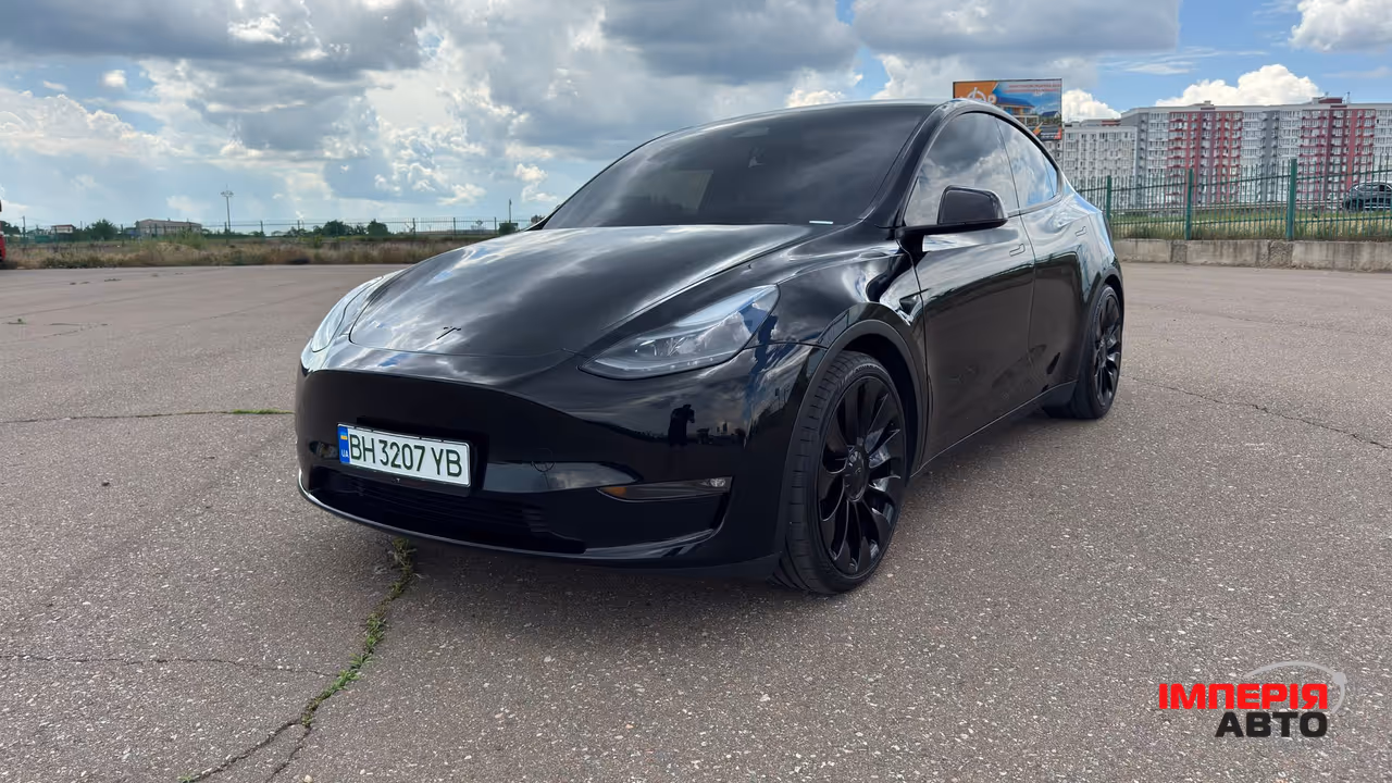 Tesla Model Y - фото 11