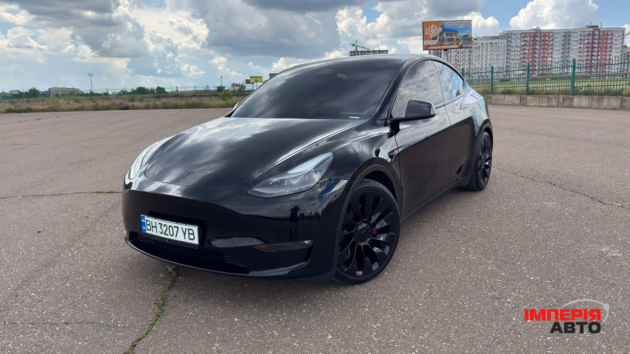 Tesla Model Y - фото 17