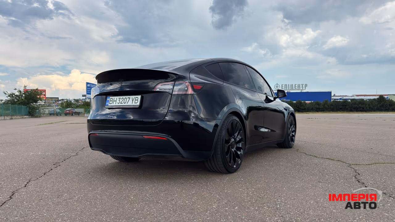 Tesla Model Y - фото 14