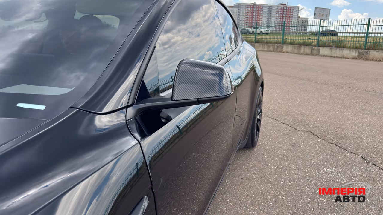 Tesla Model Y - фото 18