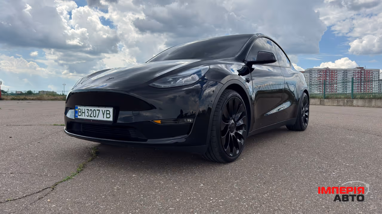 Tesla Model Y - фото 8