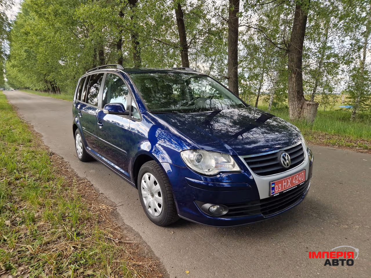 Volkswagen Touran - фото 4