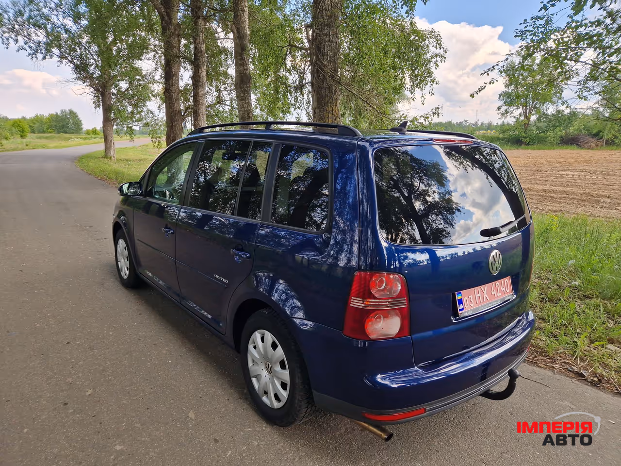 Volkswagen Touran - фото 12