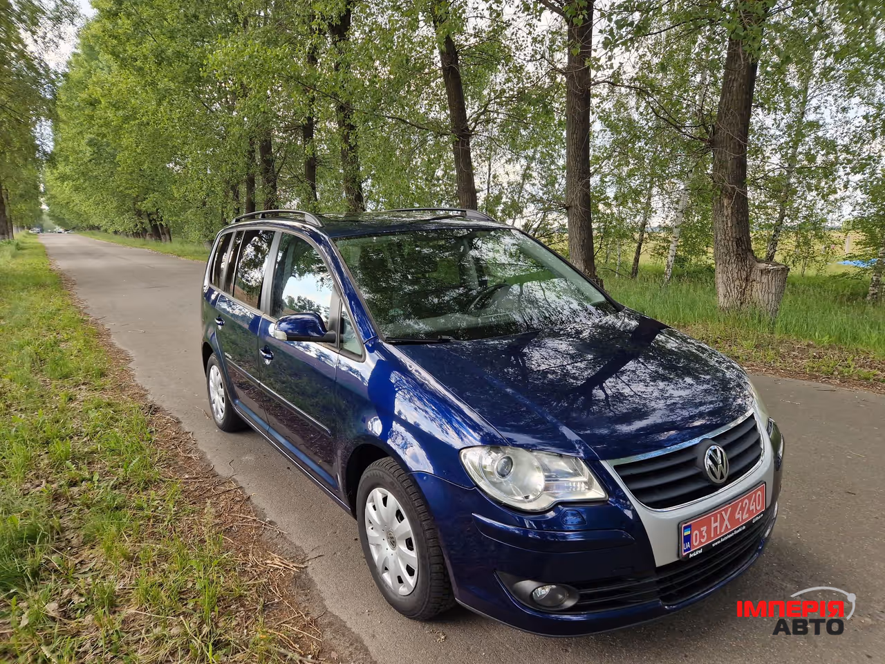 Volkswagen Touran - фото 5