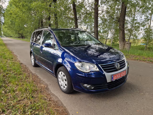 Volkswagen Touran - фото 4