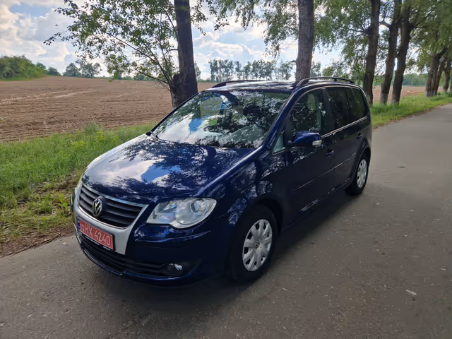 Volkswagen Touran - фото 2