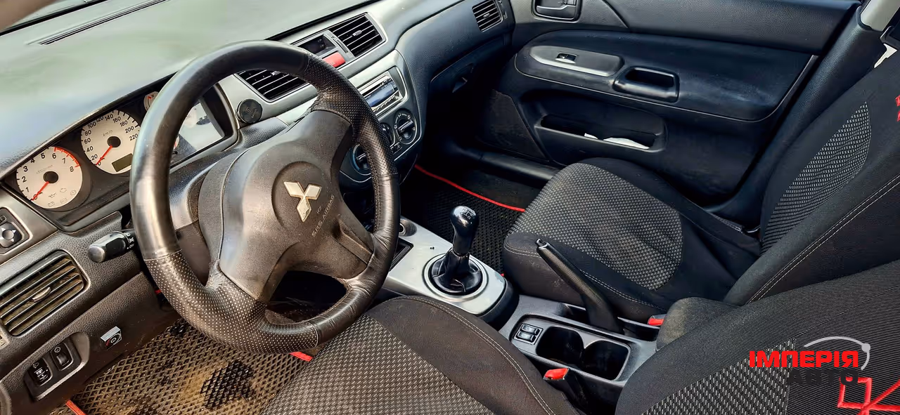 Mitsubishi Lancer - фото 2