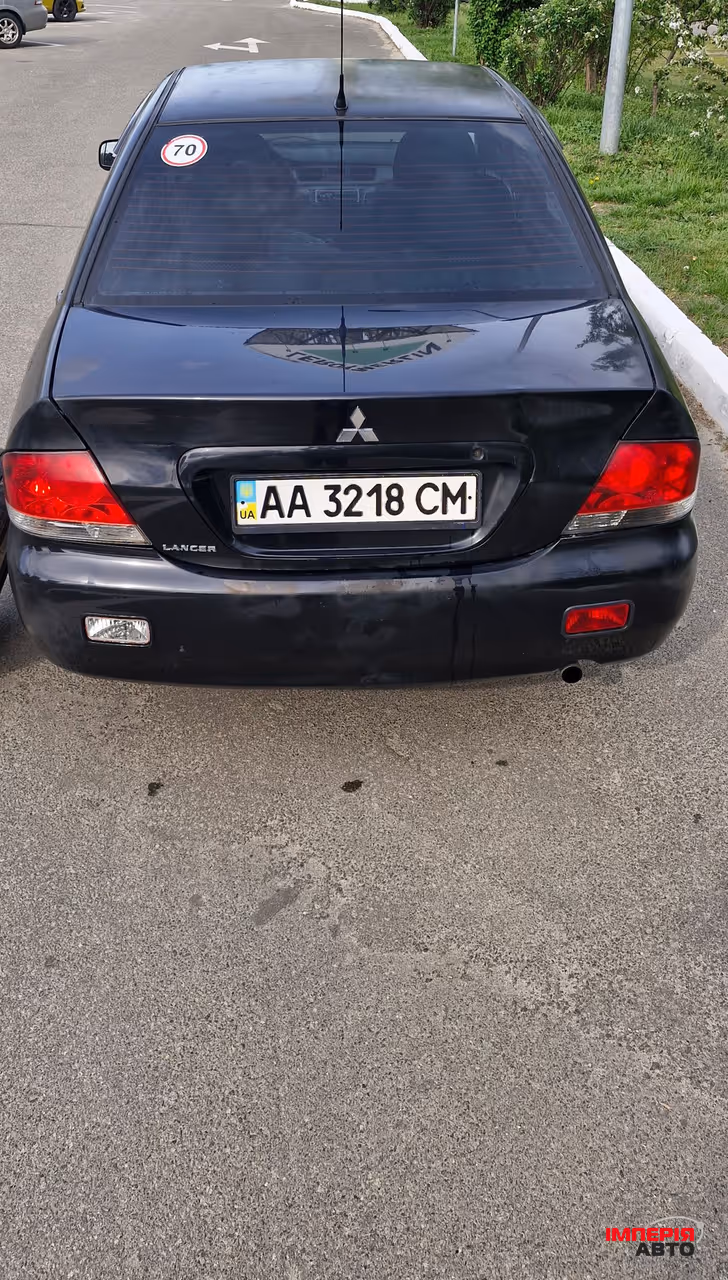 Mitsubishi Lancer - фото 6