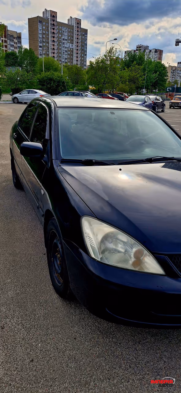 Mitsubishi Lancer - фото 4