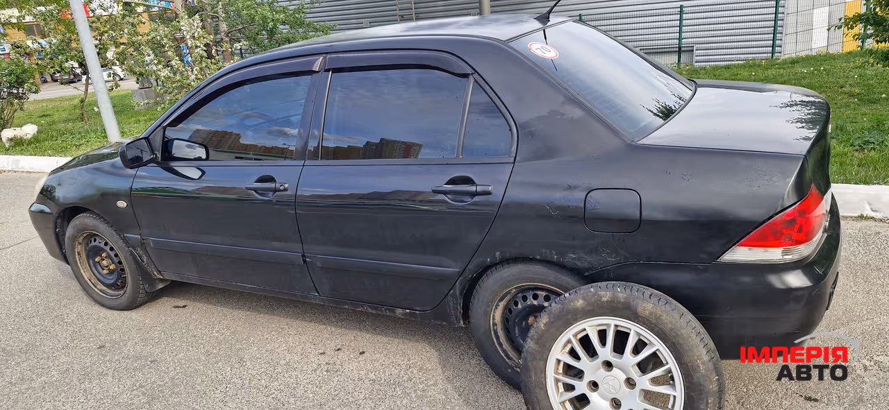 Mitsubishi Lancer - фото 5
