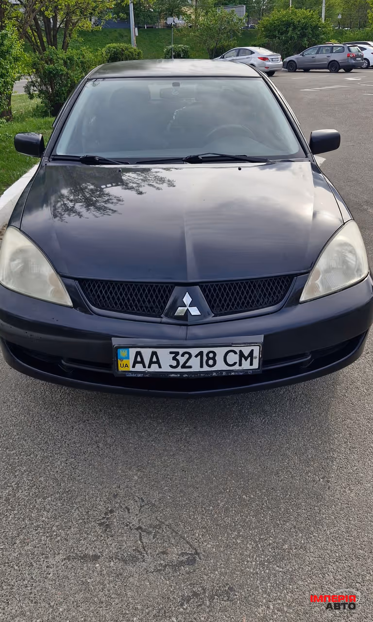 Mitsubishi Lancer - фото 1