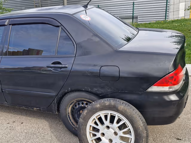 Mitsubishi Lancer - фото 5