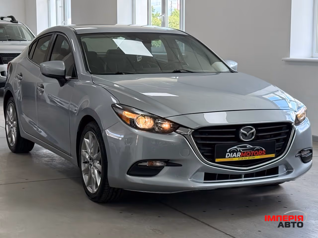 Mazda 3 - фото 2