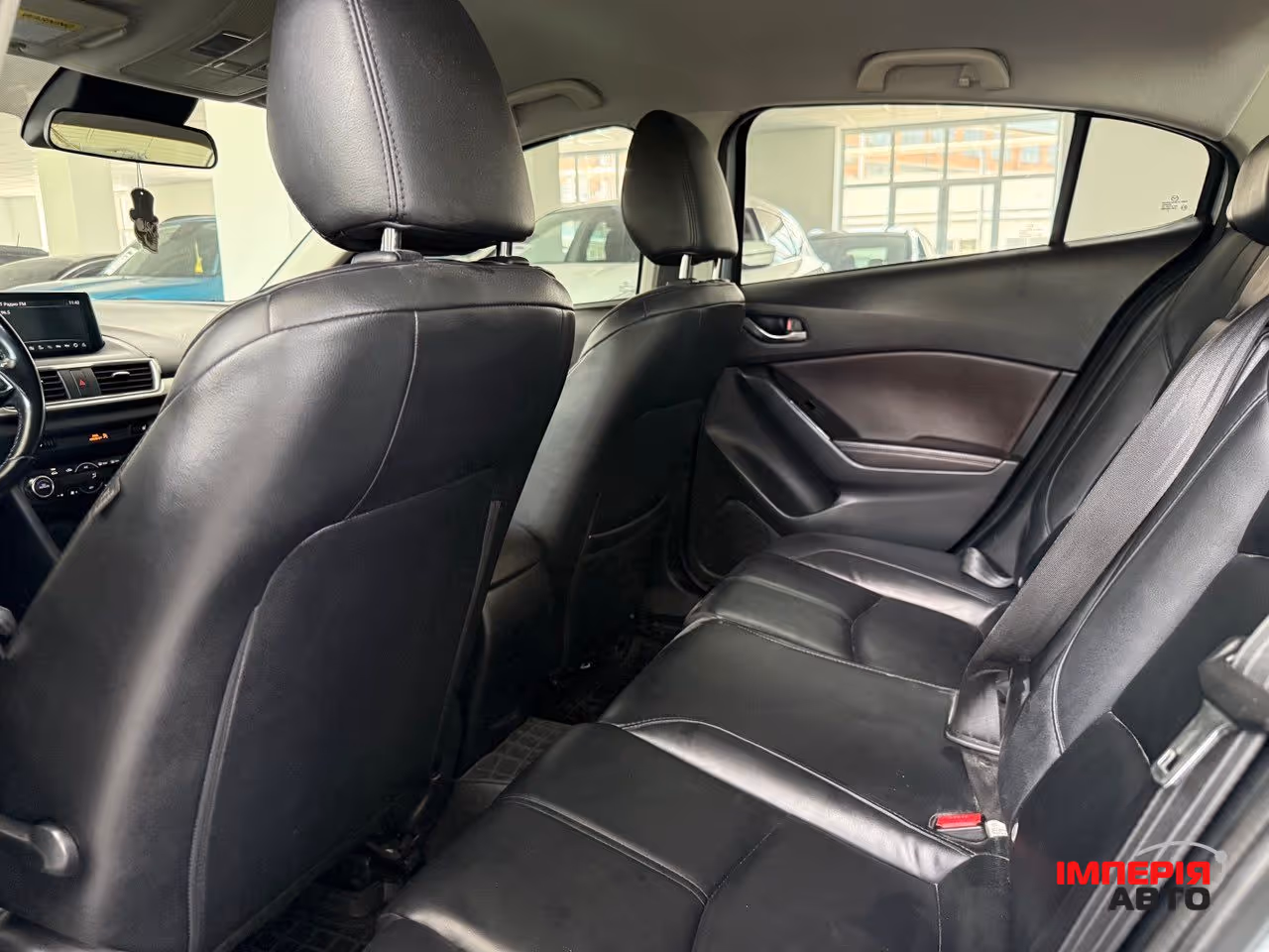 Mazda 3 - фото 7