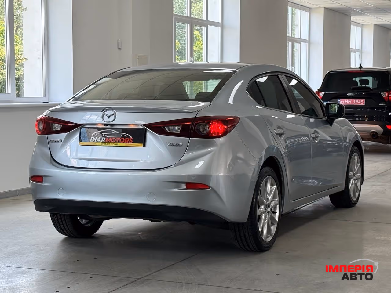 Mazda 3 - фото 3