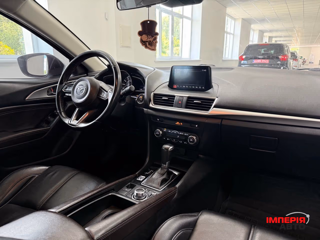 Mazda 3 - фото 5