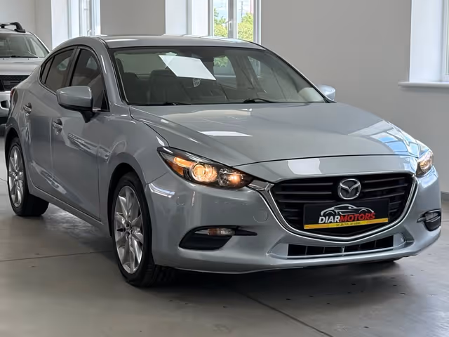 Mazda 3 - фото 2