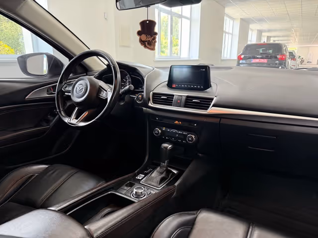 Mazda 3 - фото 5