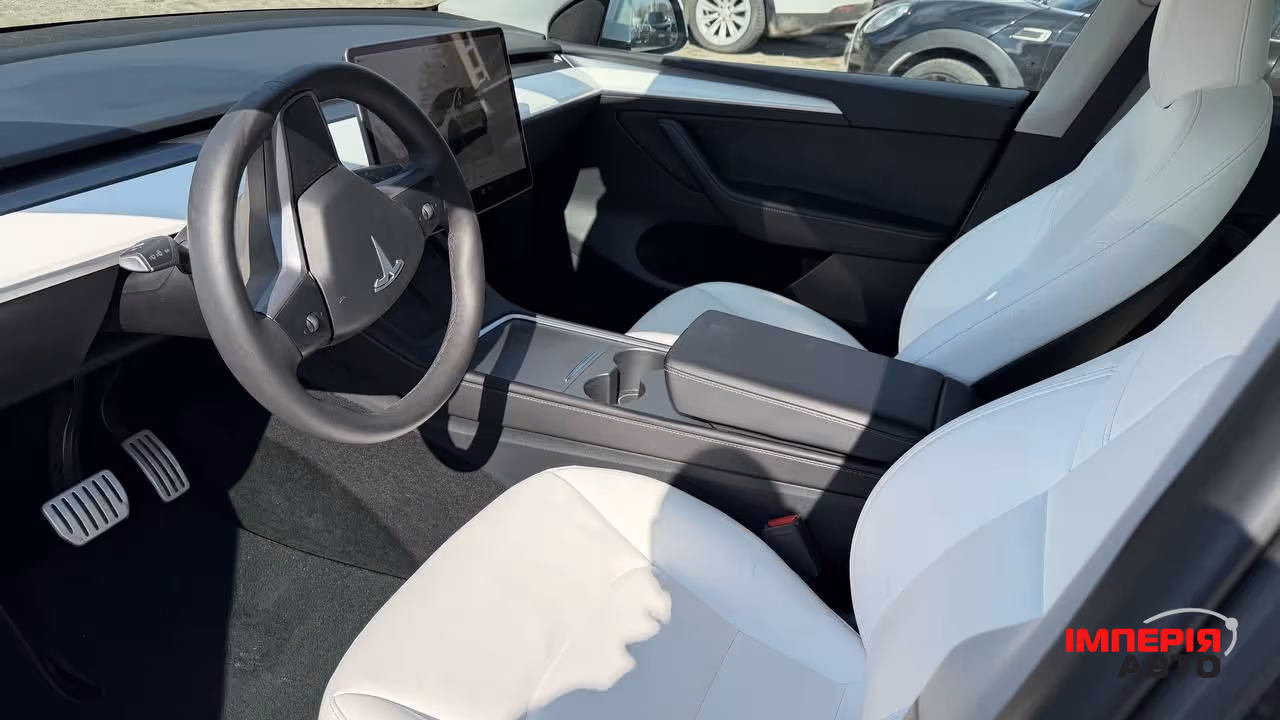 Tesla Model Y - фото 8