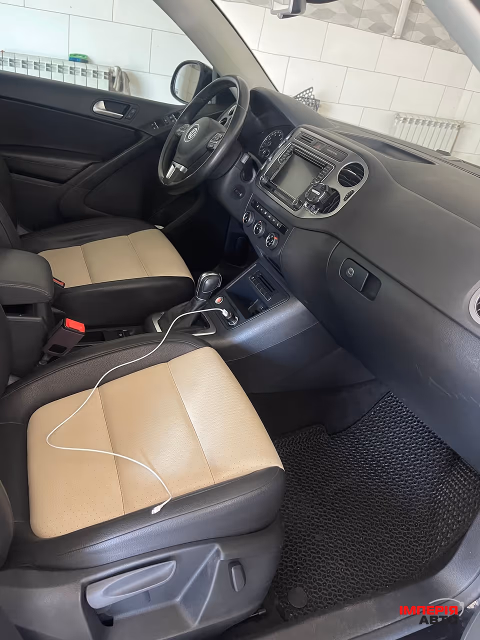 Volkswagen Tiguan - фото 12