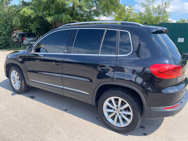 Volkswagen Tiguan - фото 5
