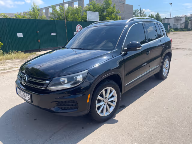 Volkswagen Tiguan - фото 1