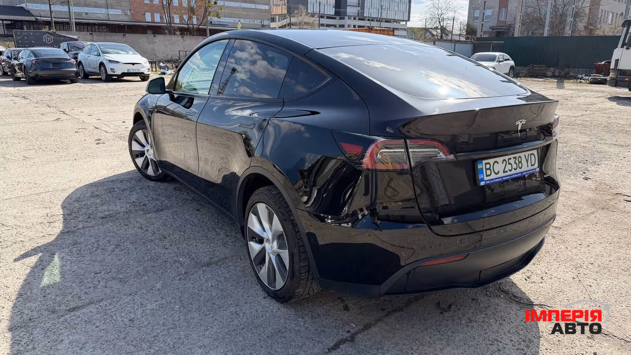 Tesla Model Y - фото 7