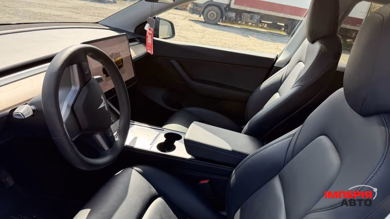 Tesla Model Y - фото 11