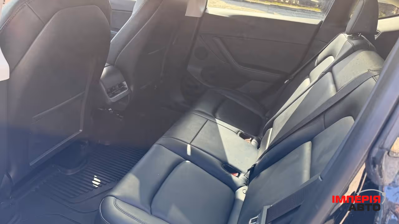 Tesla Model Y - фото 10