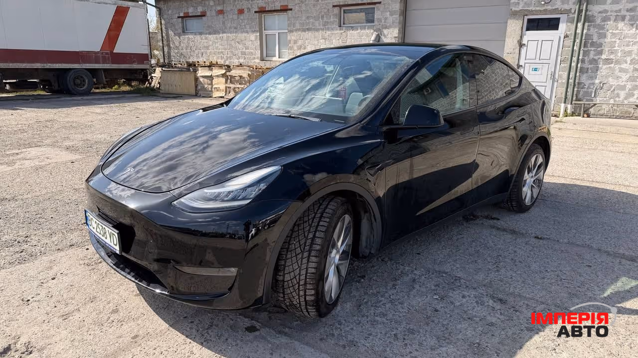 Tesla Model Y - фото 9