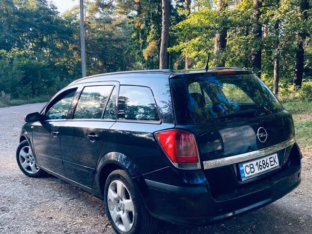 Opel Astra - фото 4