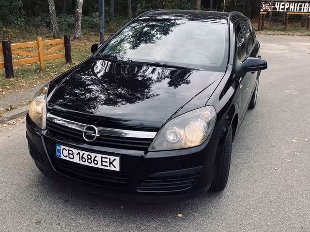 Opel Astra - фото 1