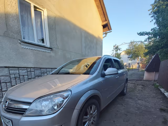 Opel Astra - фото 1