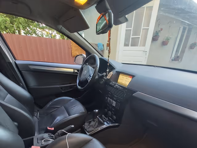 Opel Astra - фото 5