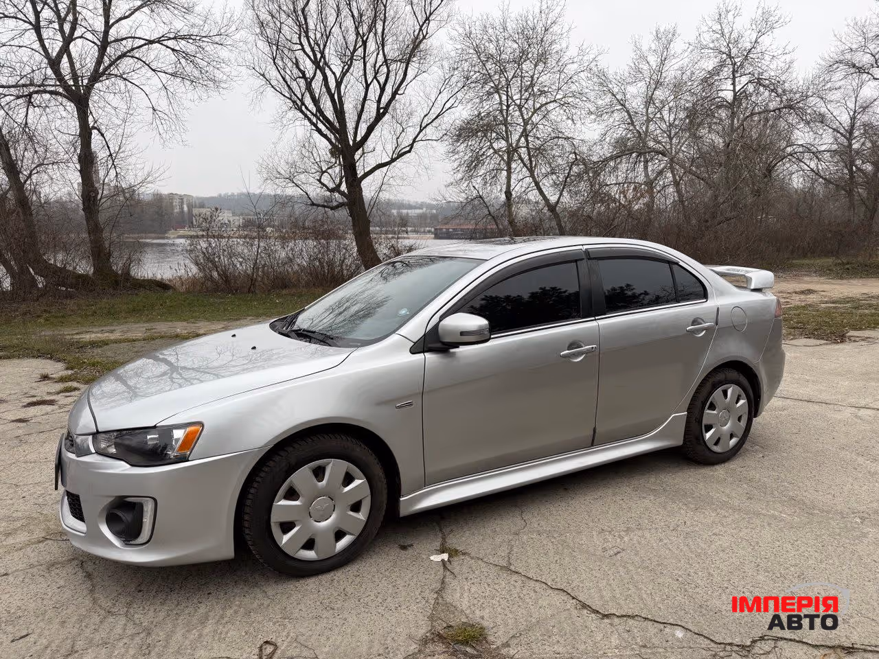 Mitsubishi Lancer - фото 1