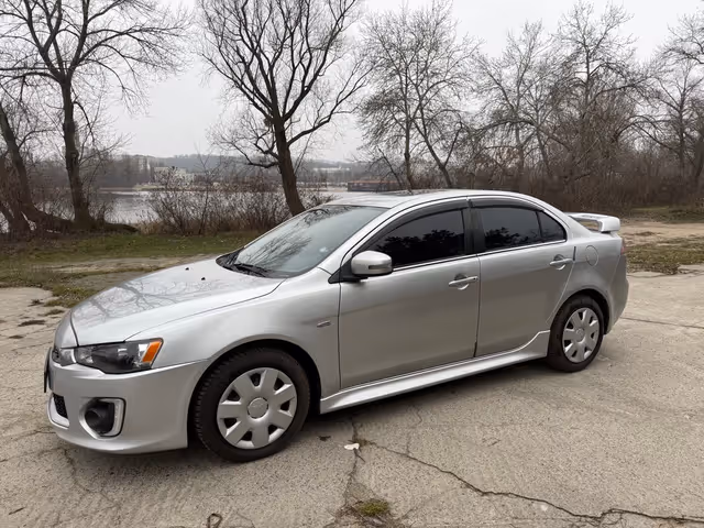 Mitsubishi Lancer - фото 1