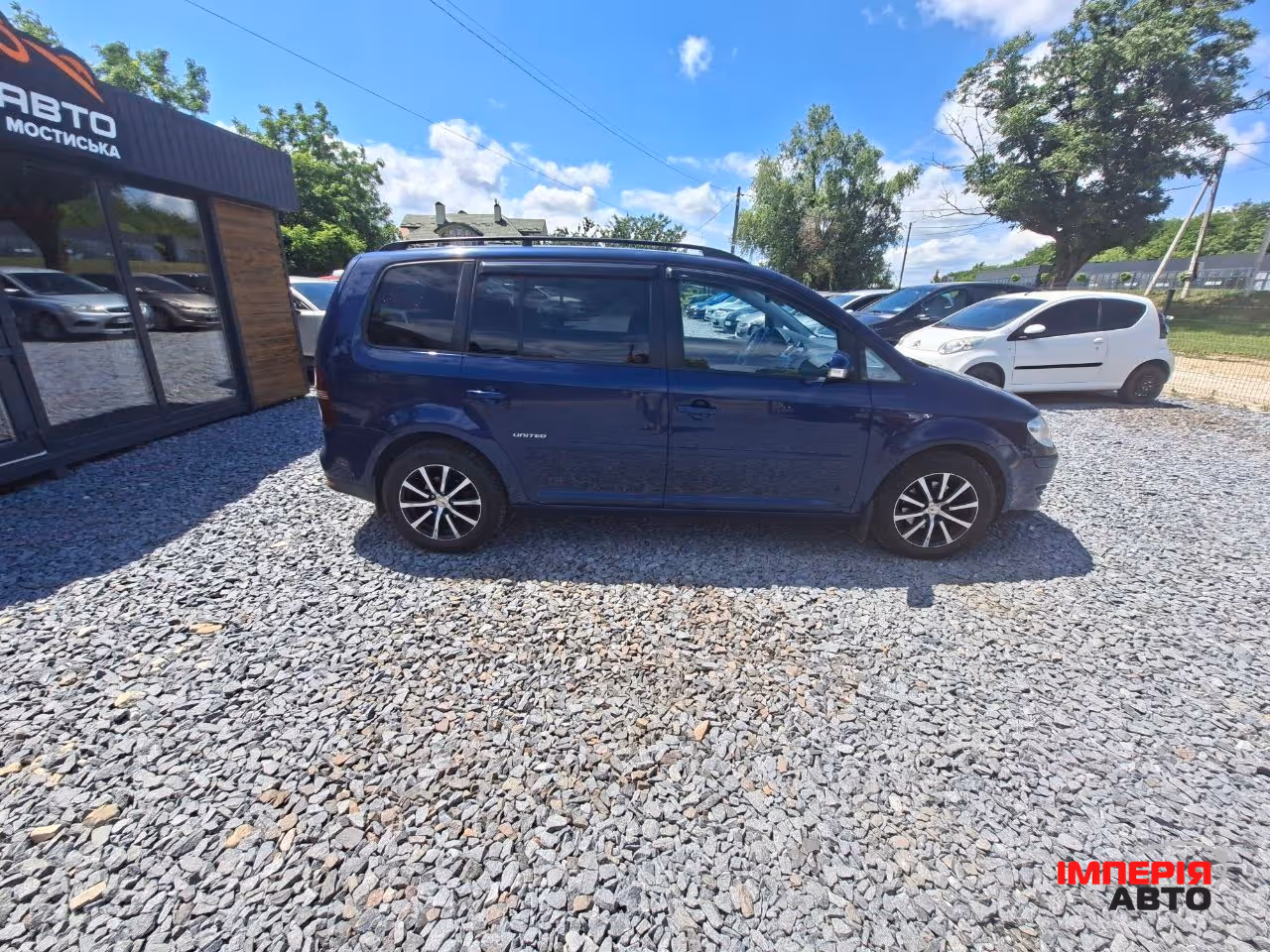 Volkswagen Touran - фото 7