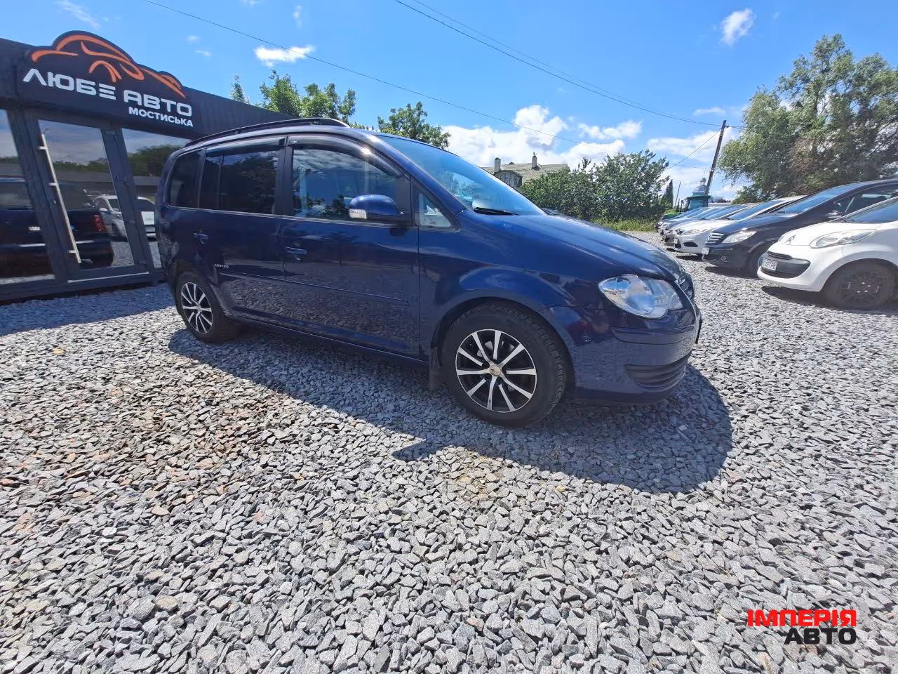 Volkswagen Touran - фото 5